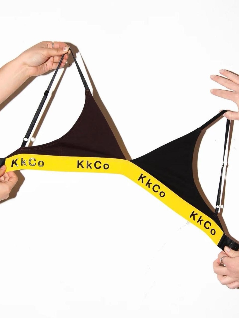 Black and yellow KKCO bralette top with matching bottoms